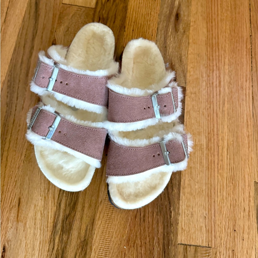 Size 37 Birkenstock Arizona with shearling insole New.  Never worn.  Pink suede